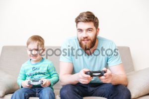 depositphotos_110058990-stock-photo-smiling-dad-and-son-playing
