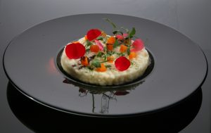 Chef Stefano Mattara, ricetta “Risotto al parmigiano, zucca caramellata, noci pecan e polvere di caffè”